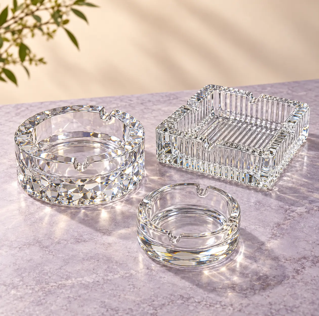 Elegant trio of glass ashtrays